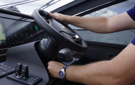 Fairline Targa 58 GTO steering wheel and engine throttles at the helm