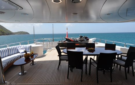 sundeck and dining area on benetti luxury yacht pida