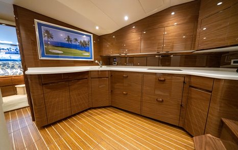 Viking 54SC sportsfisher yacht interior galley with wooden detailing