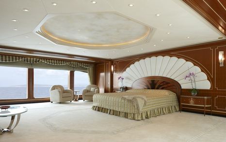 Master cabin on board Lady Christine with spacious room and carpeting