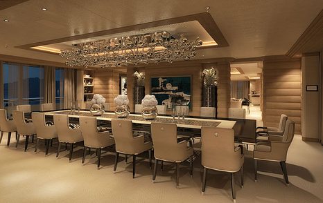 Dining area of LANA superyacht by Benetti. Twenty seats around long rectangular table is luxurious dining area.