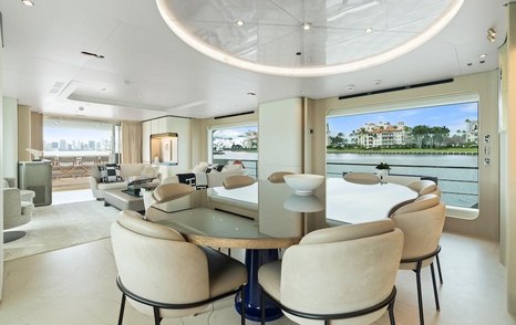 Superyacht Freedome main saloon circular dining area