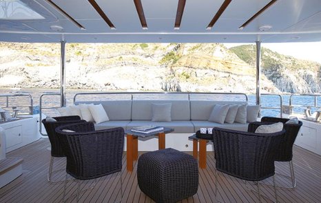 An exterior lounging section on board a Benetti Mediterraneo 116