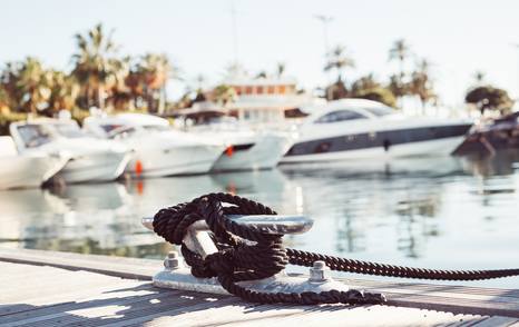 loaded cleat with yachts in background