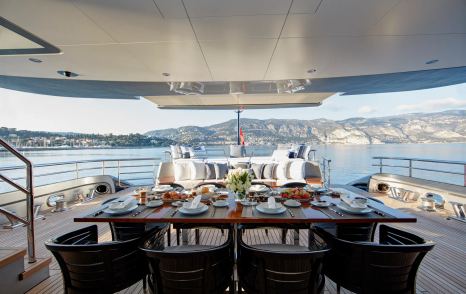 Superyacht Excellence V aft seck with al fresco dining