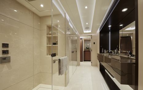 Master bathroom onboard Heesen 'Project Triton', his and hers sinks to starboard with rain shower port side