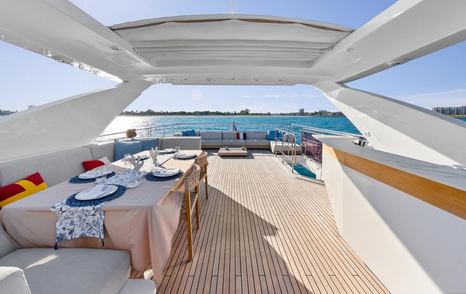 superyacht flybridge with dining area