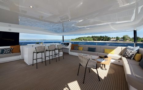 Rendering of Silent Yachts SY62 3-Deck Open's shaded lounging area