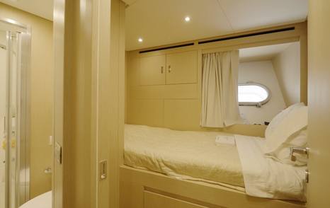 Crew cabin on the Sanlorenzo SHE with single berth and opening porthole