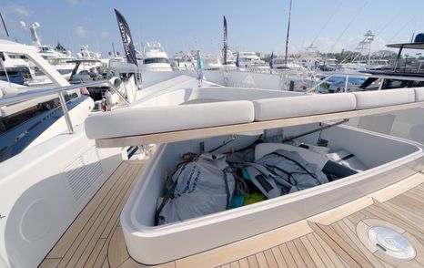 Benetti Oasis 34M foredeck storage locker beneath the sunpad, providing space for water toys and deck equipment.