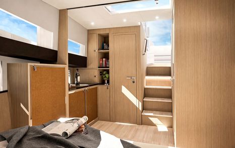 The galley onboard the Fjord 490 benefits from light decor and expansive windows to let in an abundance of natural light