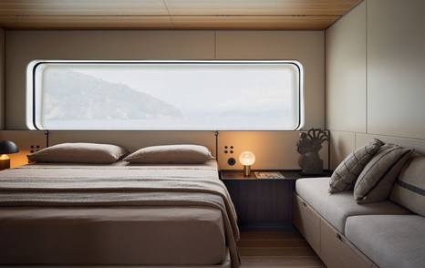 Bluegame BGX83 motor yacht master cabin with window 