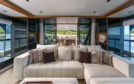 Riva 54Metri Superyacht Sairu white L-shaped sofa and glass sliding doors 