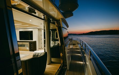 Superyacht Batarli's glass sliding doors in main saloon