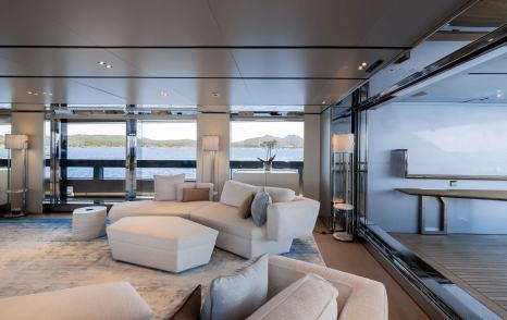 Superyacht Flying Dagger III main saloon curved white seating 