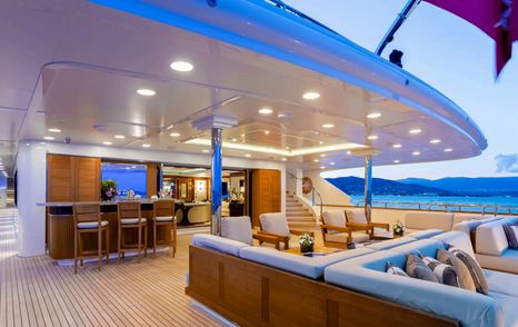 Superyacht Seanna's  aft deck seating and bar area 