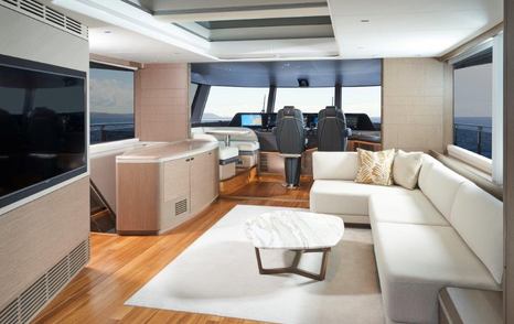 Skylounge on PRincess X95 with large sofa and flatscreen TV