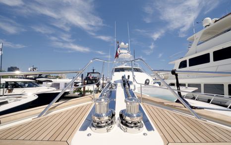 Fleming 85 twin-anchor foredeck arrangement with substantial mooring hardware and teak decking