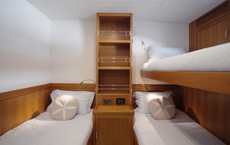 Fleming 85 twin guest cabin with Pullman berth and custom family accommodation layout