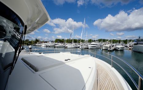 Beneteau Grand Trawler 63 foredeck showing recessed sunpads and safe access around the cabin
