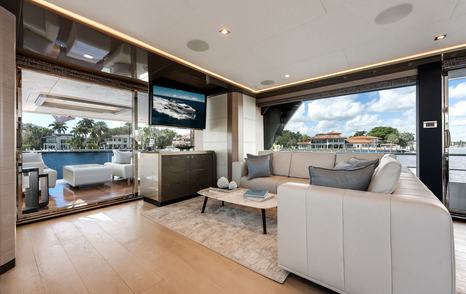 Ocean Alexander 28E motor yacht main saloon seating area with fold out TV