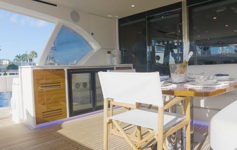 Riviera-78-Motor-Yacht-Enclosed-Bridge-Deck-Review-cockpit-bar