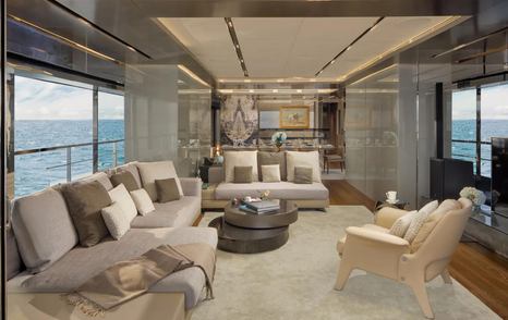 sun prince main saloon with cream and grey sofas