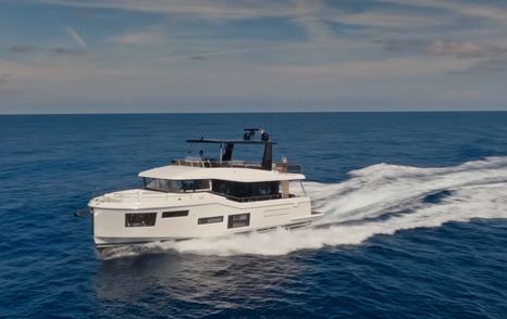 Beneteau Grand Trawler 63 underway demonstrating its full-displacement hull at cruising speed