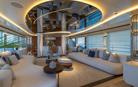 Superyacht Eternal Spark main saloon with curved LED lighting and cream furntiure 