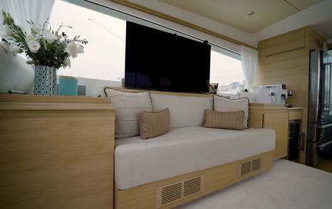 Delta-Powerboats-72-Review-saloon-sofa-tv