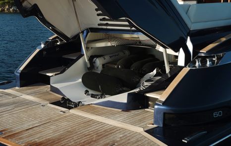 Solaris-Power-60-Coupe-Review-aft-garage-interior-with-tender-and-launch-system