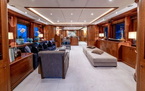 Superyacht Sea Blue'Z main saloon with white flat sofa and teak
