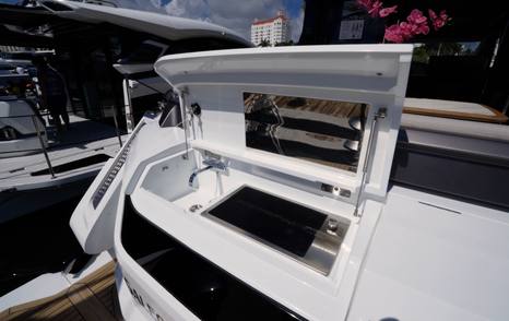 Galeon 520 Fly cockpit grill station with integrated cooking area and storage