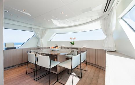 Motor yacht Fitline indoor dining area