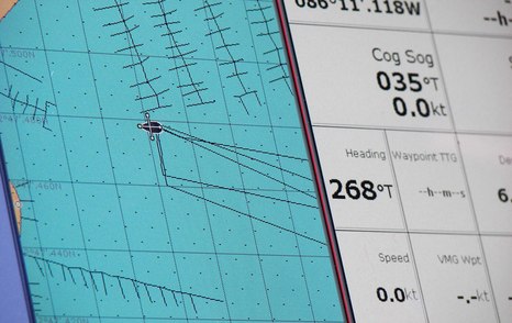 Close up on chartplotter onboard yacht