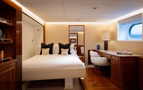 Aqua Lares superyacht guest cabin with desk 