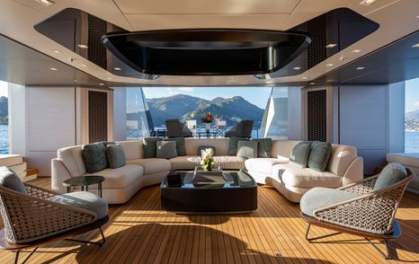 Superyacht Diamond Binta main saloon with U-shaped sofa