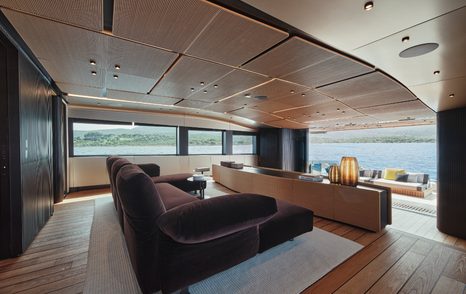 wallywhy150 motor yacht main saloon with U-shaped sofa