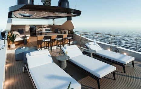 Mangusta GranSport 34 motor yacht sundeck with sun loungers and shaded bar area