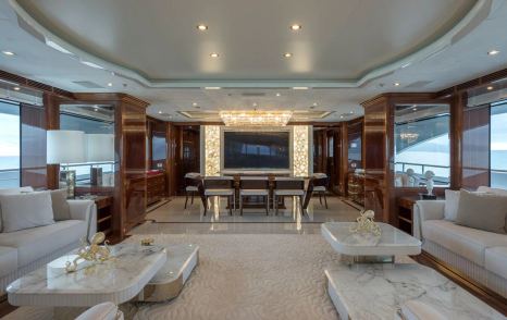 Superyacht Rhino main saloon with white sofas and white marble coffee table