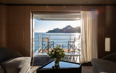 Superyacht Diamond Binta main saloon balcony with chairs 