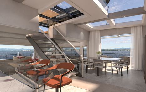 Central staircase onboard Extra Yachts VILLA X30 catarmaran. Interior dining option at base of stairs with large panoramic windows in background.