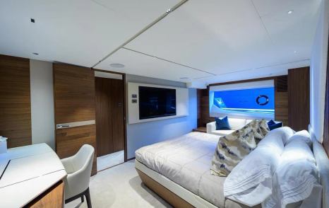 Bedroom with desk onboard Motor Yacht Escape 