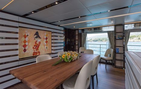 Superyacht Chrimi III's main saloon dining area