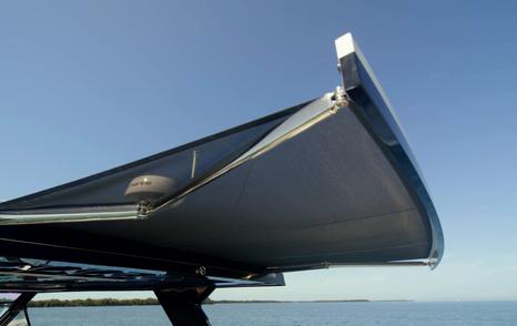Aquila 45 Sport extending sunshade from hardtop, showing aft cockpit shade system for sun protection