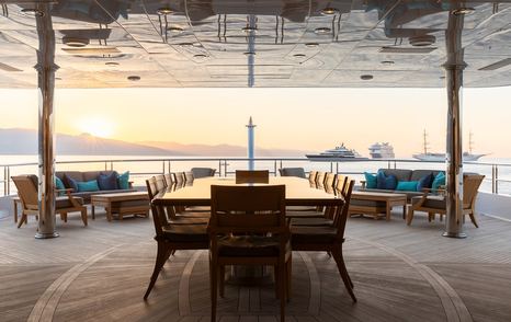 Superyacht Skyfall main aft deck with shaded alfresco dining