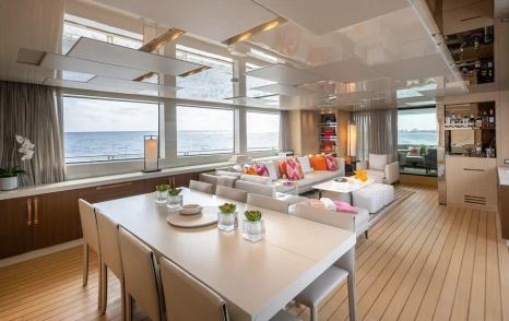Motor yacht Xwave's main saloon dining area