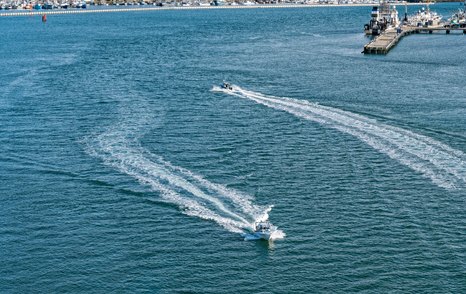 two boats passing port to port keeping clear