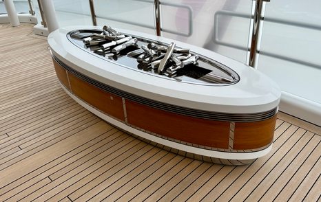 Gas fire pit feature on the owner’s deck of the Amels 242 Casino Royale.