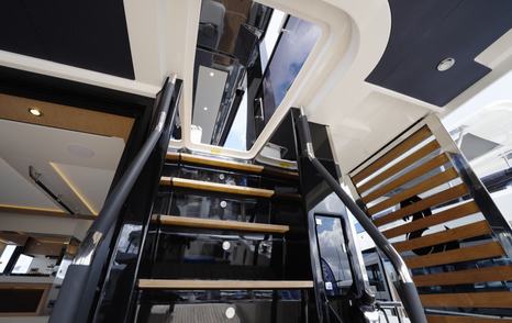 Beneteau Grand Trawler 63 flybridge staircase with secure handrails